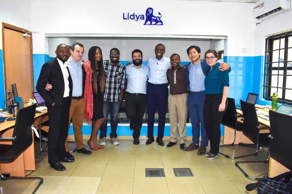 The team at Nigerian inclusive fintech Lydia stands for a group photograph inside their office.