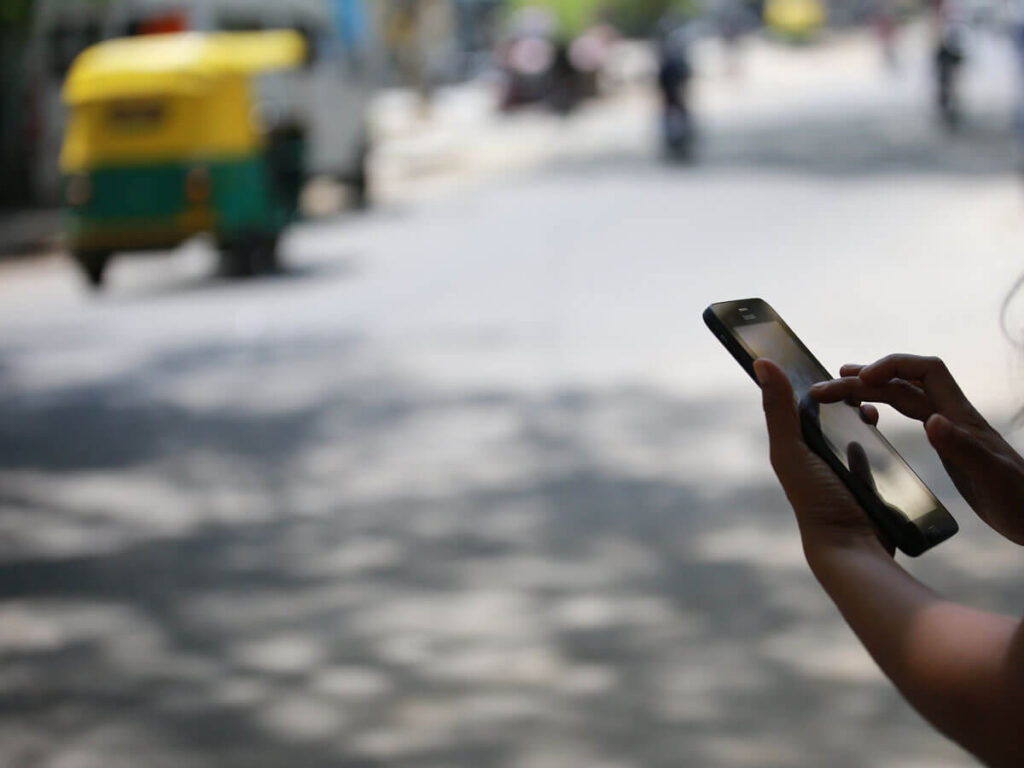 Person holding phone in Bengaluru