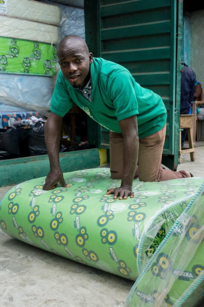 Mr. Ononyia with a mattress