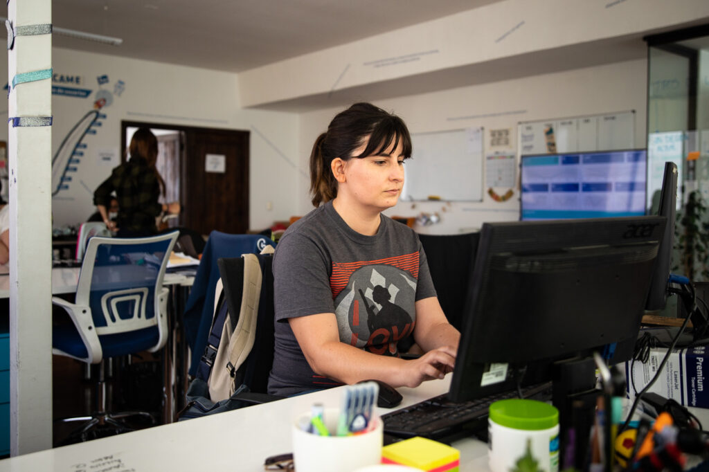 Camila Valdés works at her computer