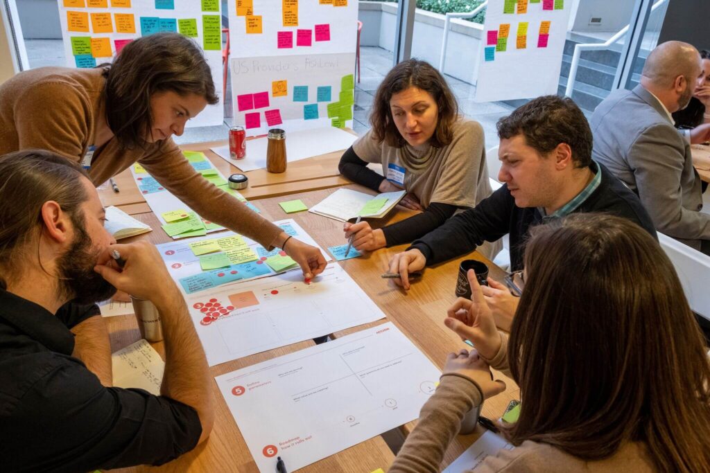 Attendees of Accion's Financial Health event participate in a workshop