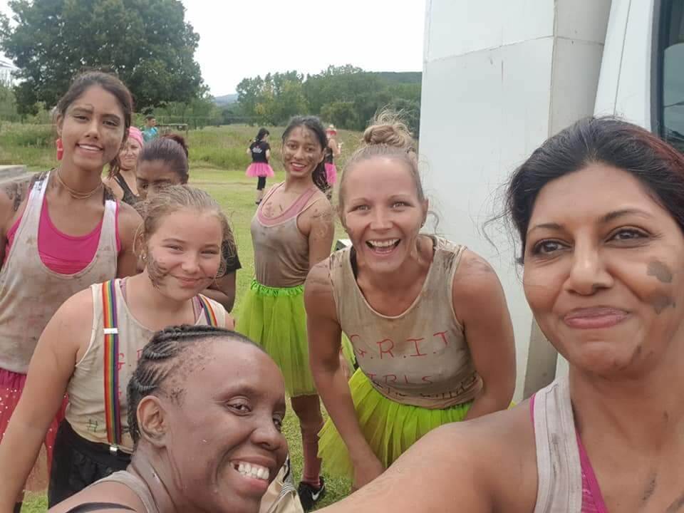Yashmita, Lulalend client in South Africa, stands with women friends for a selfie.