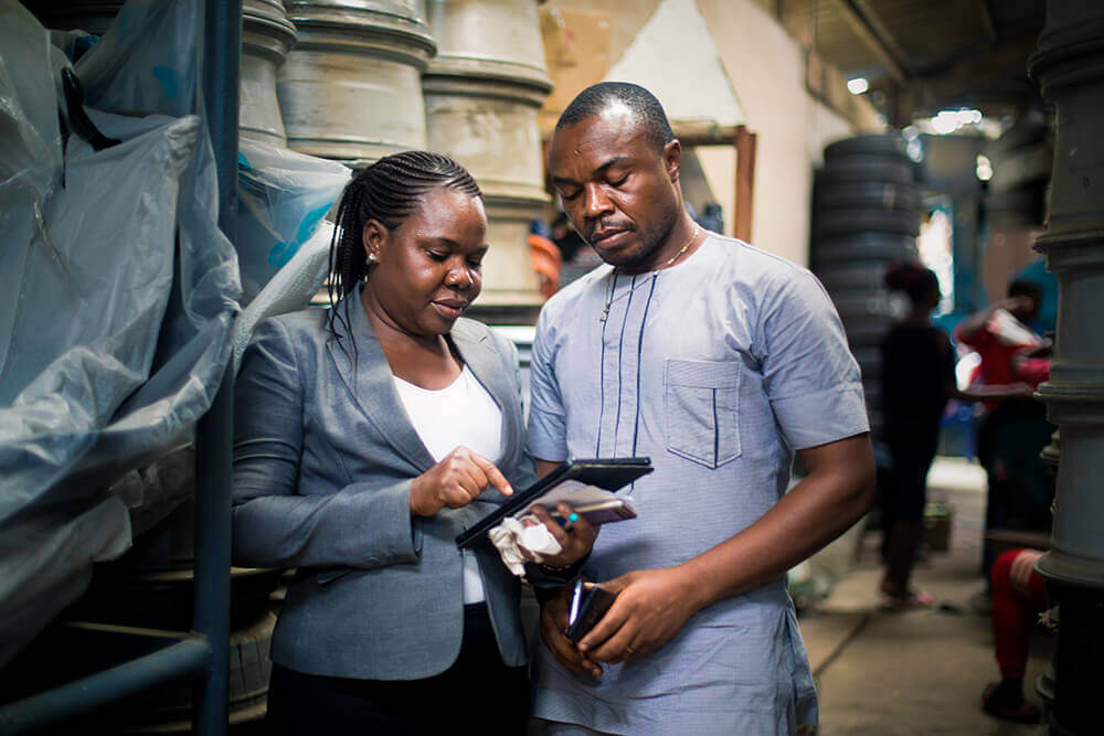 Accion Microfinance Bank client Ezeh at his business