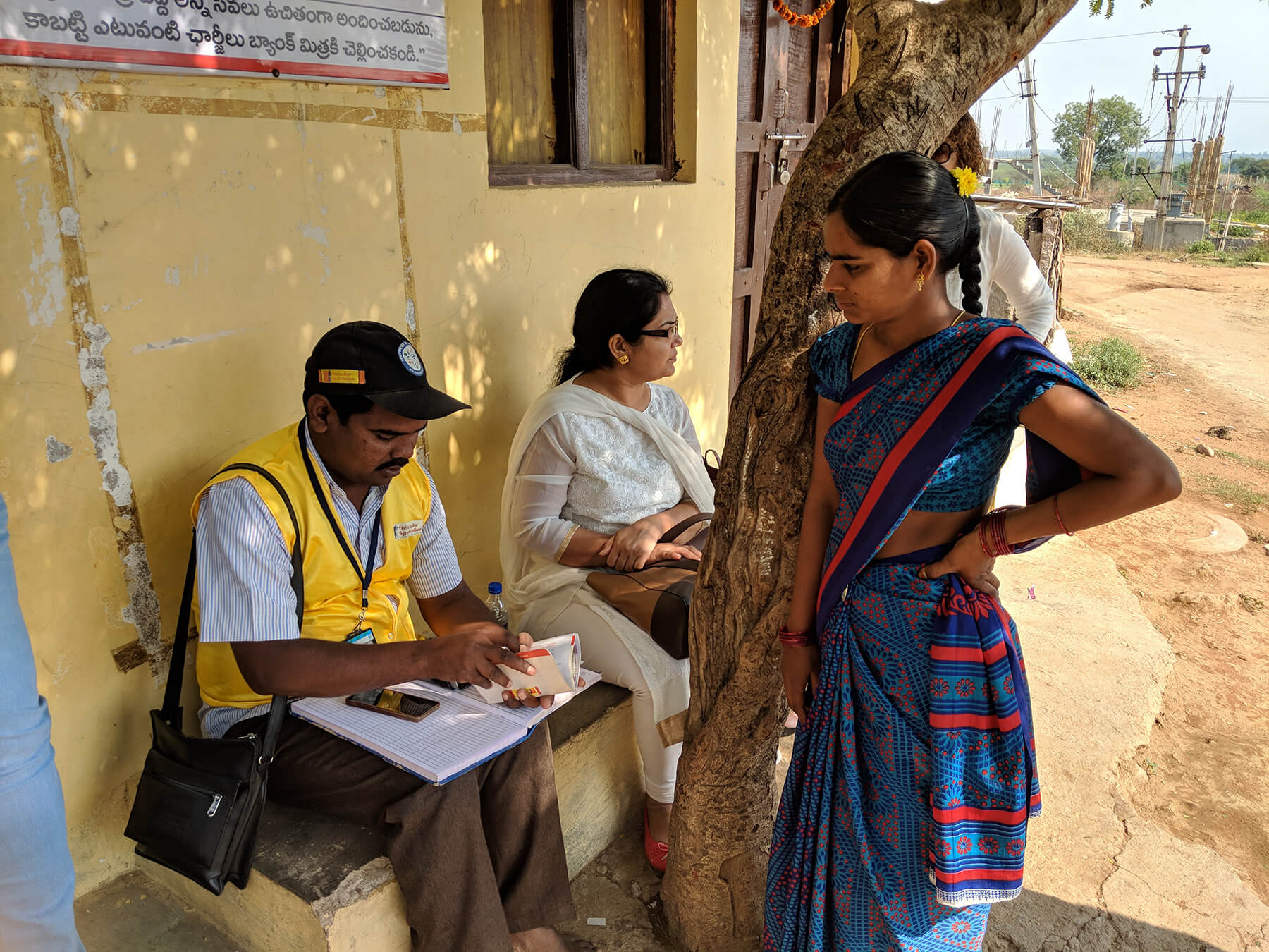 a loan officer from Sub-K assists a client