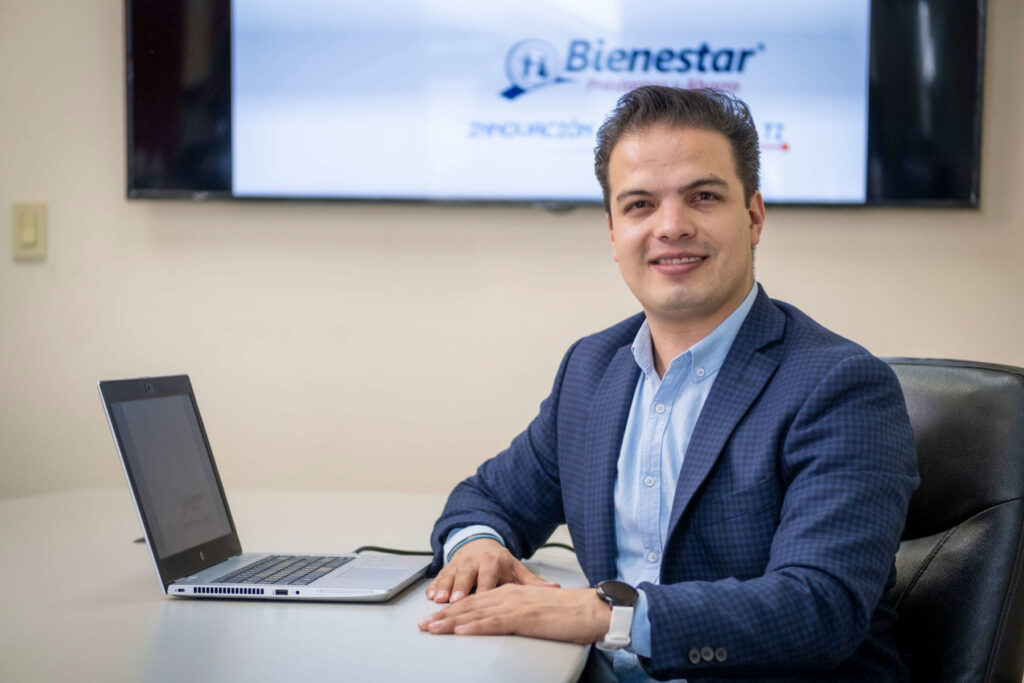 José Eduardo Ruiz, Commercial Director of Caja Bienestar, sits in his office