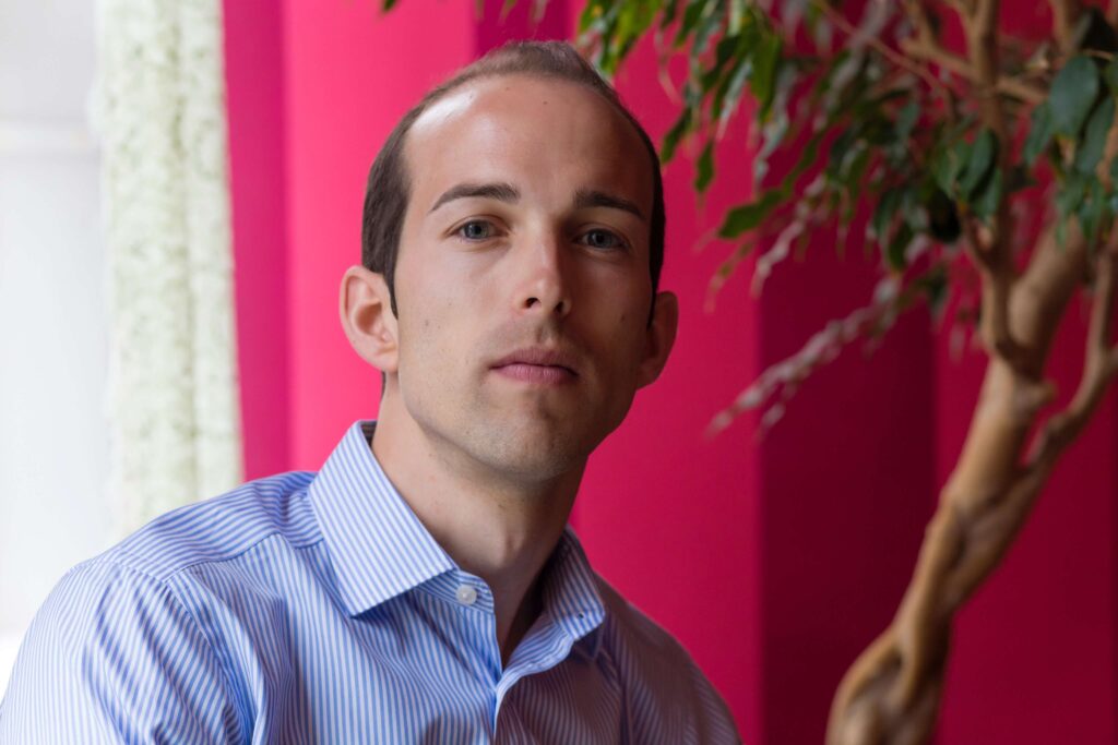 Chris Coxon - comms - Accion headshot