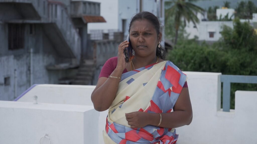 Mageshwari is talking to her phone