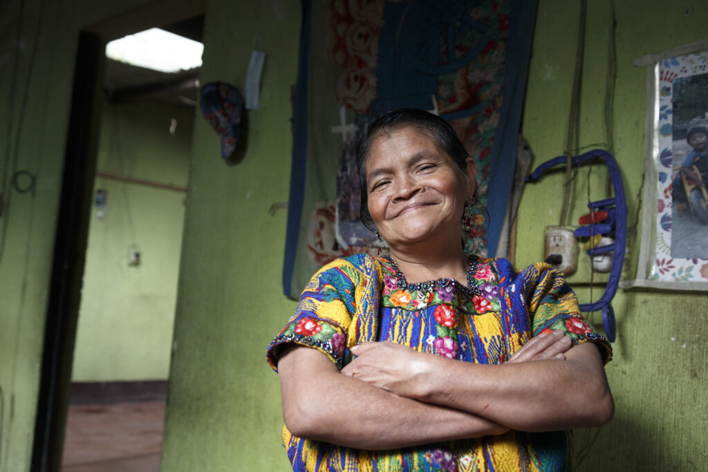 Maria, a client of Accion partner Genesis, at the small shop where she produces fabrics in Guatemala