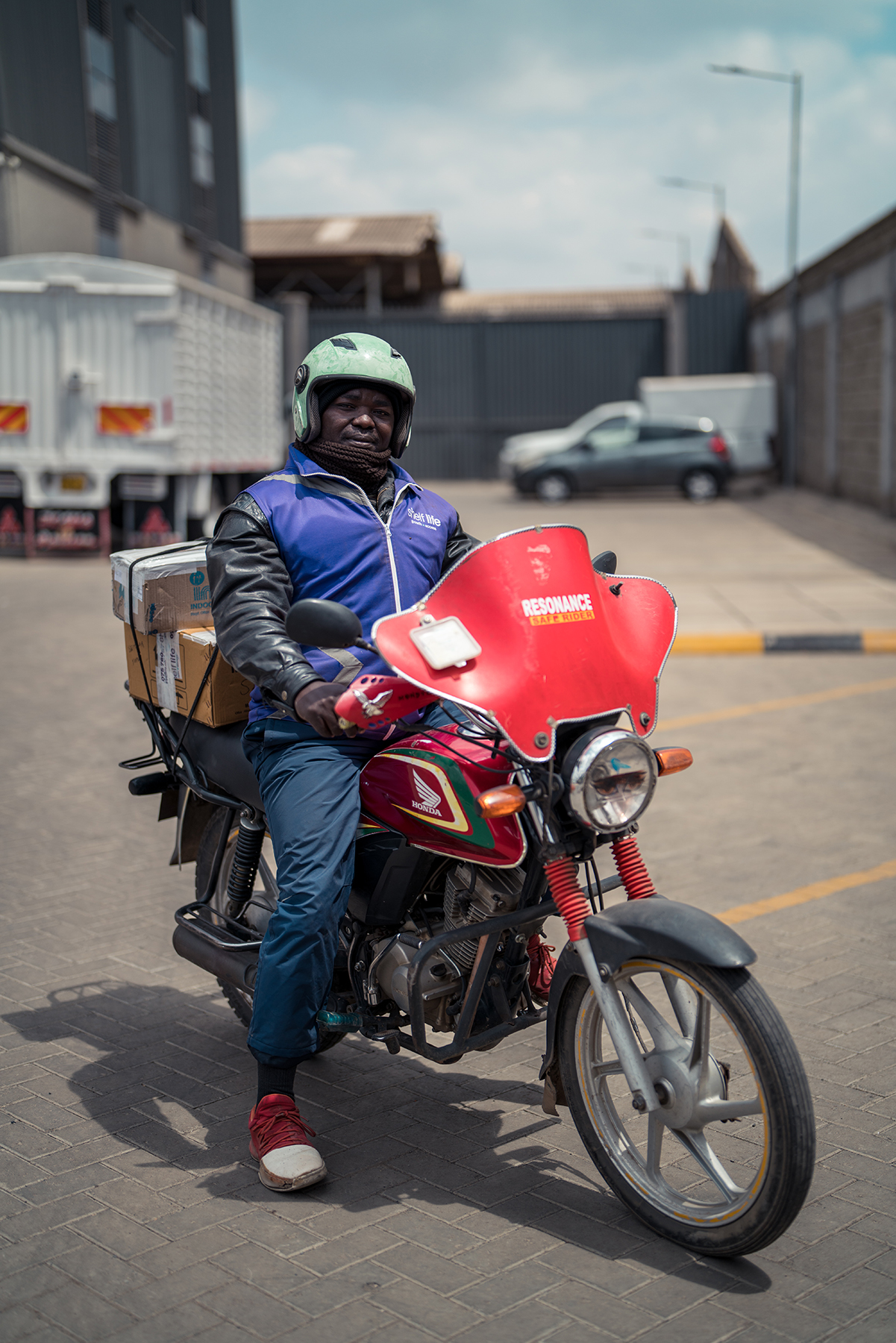 Fred delivers medication to a pharmacy in Nairobi