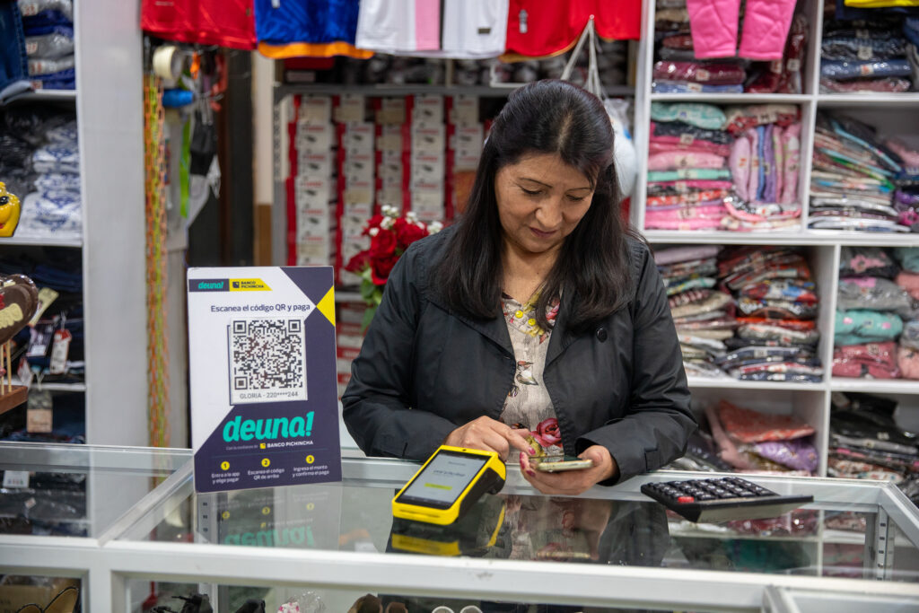 Gloria accepts digital payments at her business in Ecuador