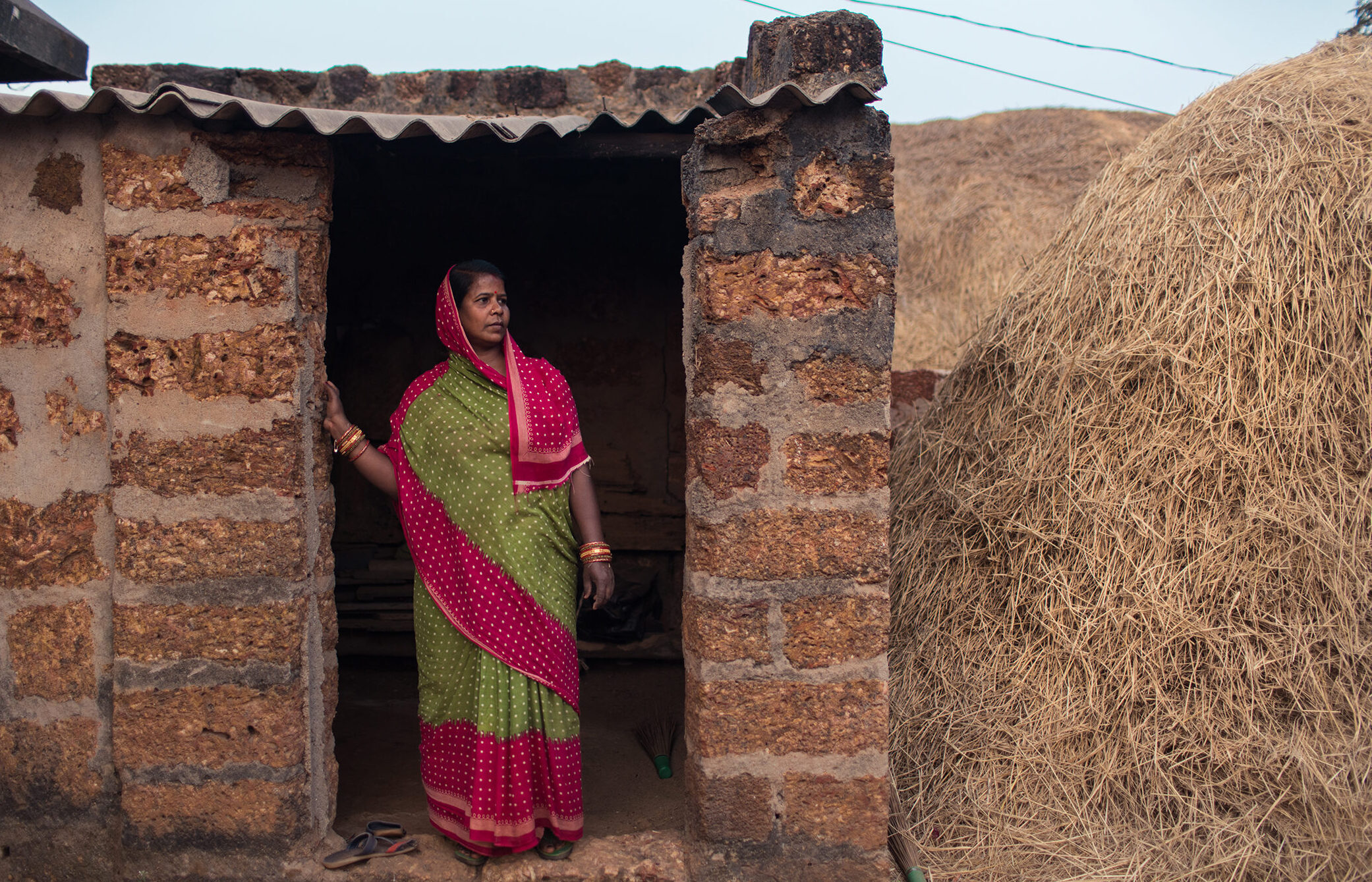 Renuka looks out on her farm in Odisha, India