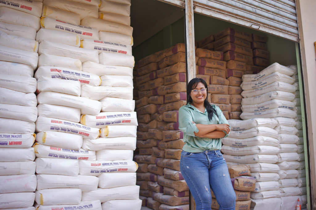 Roselin in front of her flour business in Santa Cruz, Bolivia
