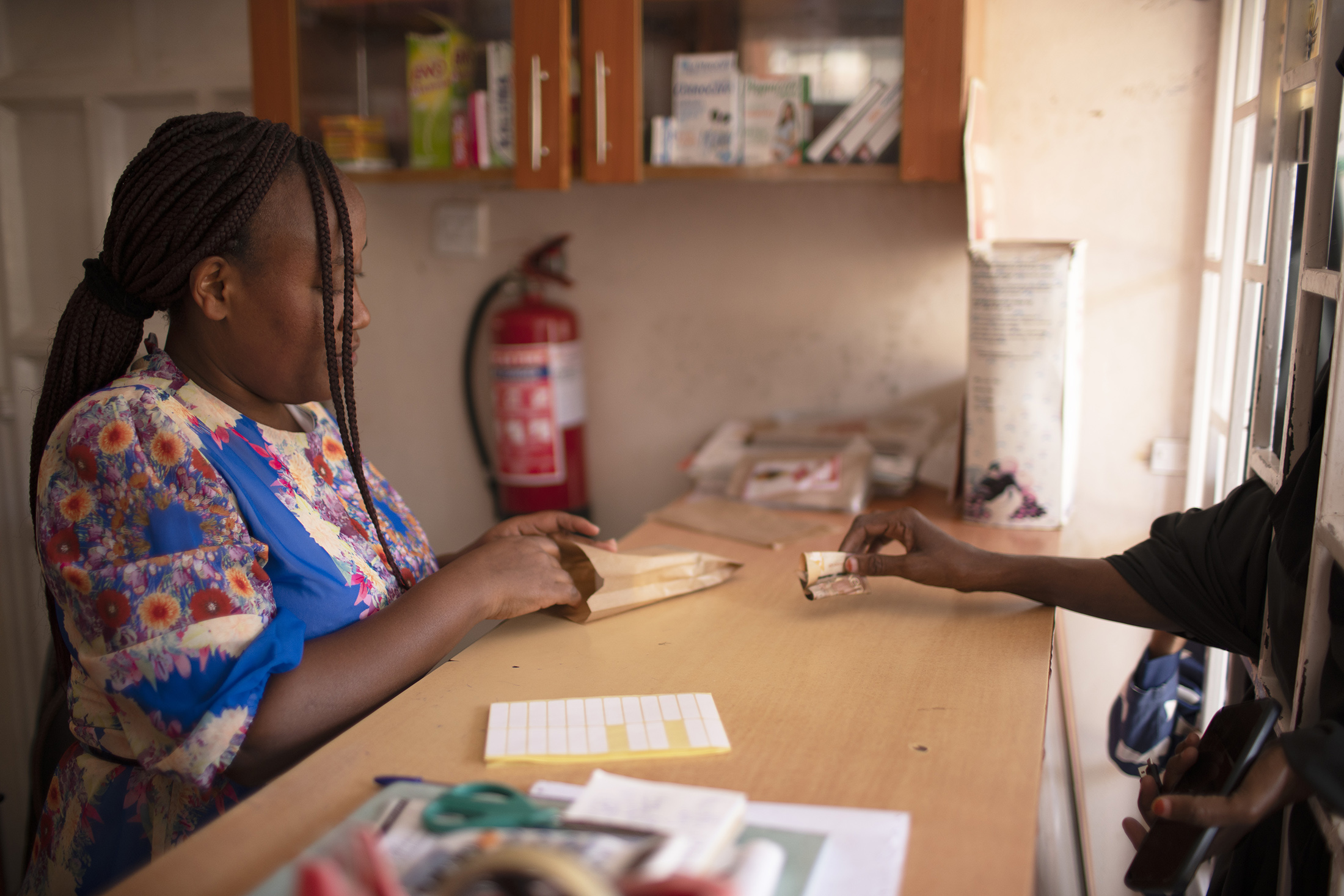 Faith at her pharmacy in Nairobi, Kenya