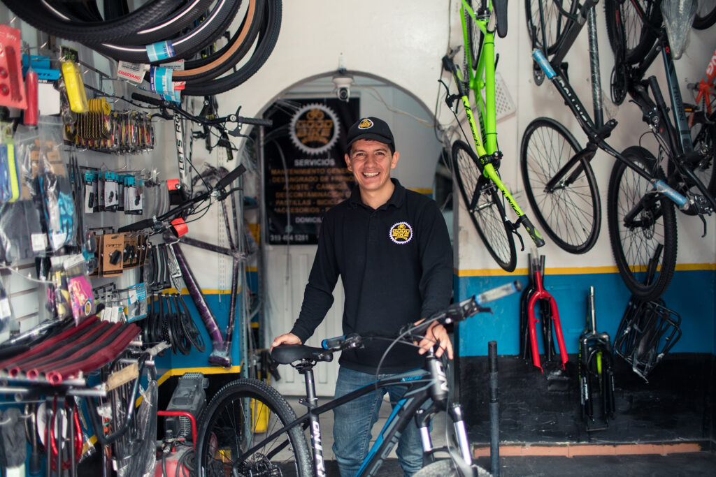 Julian at his bicycle repair shop in Bogotá, Colombia