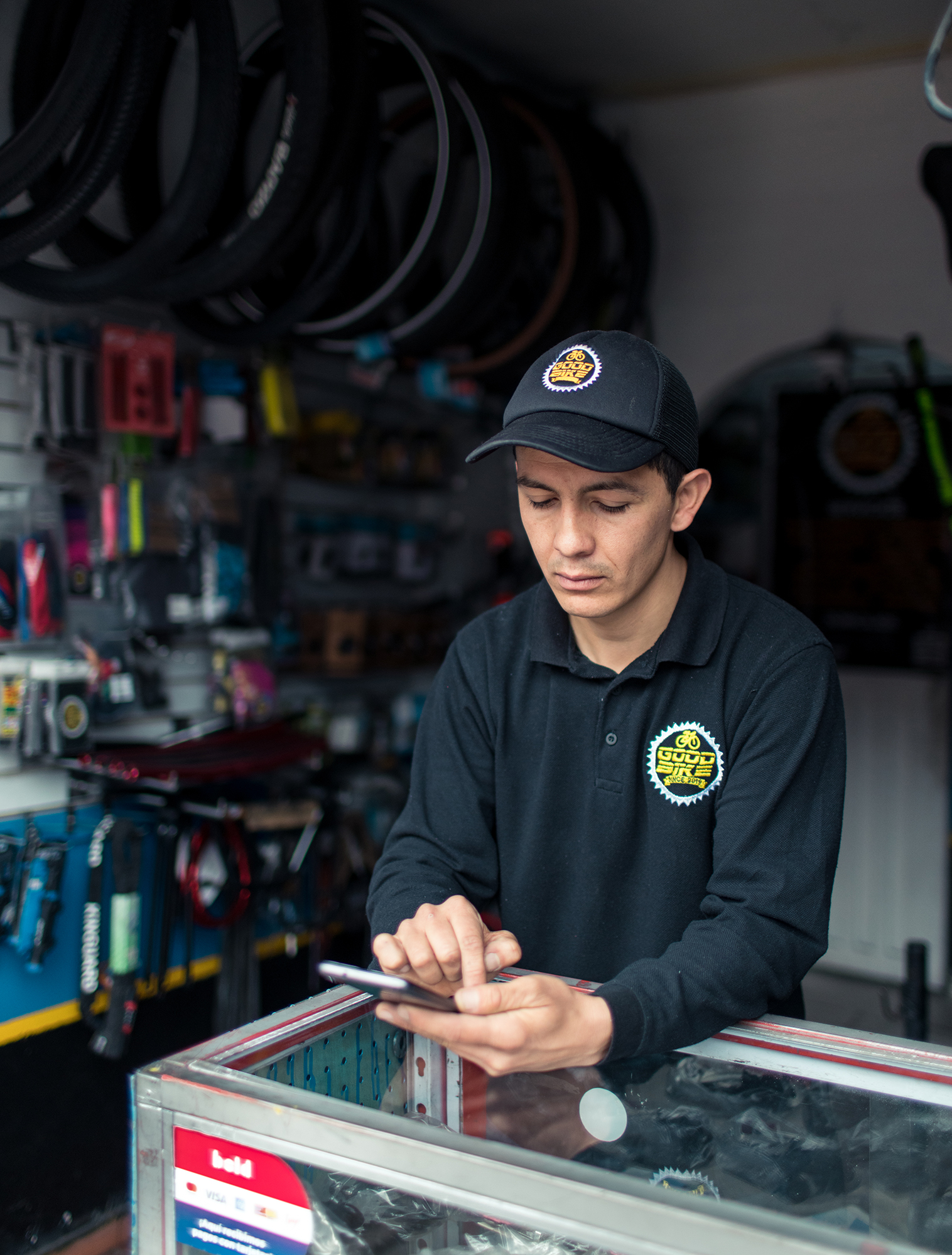 Julian at his bicycle repair shop in Bogotá, Colombia