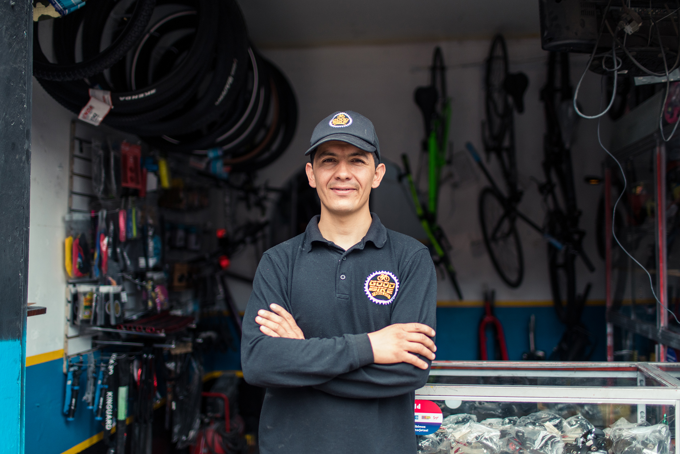 Julian at his bicycle repair shop in Bogotá, Colombia