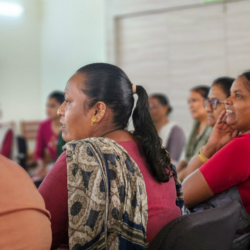 women workers share their experiences in a focus group