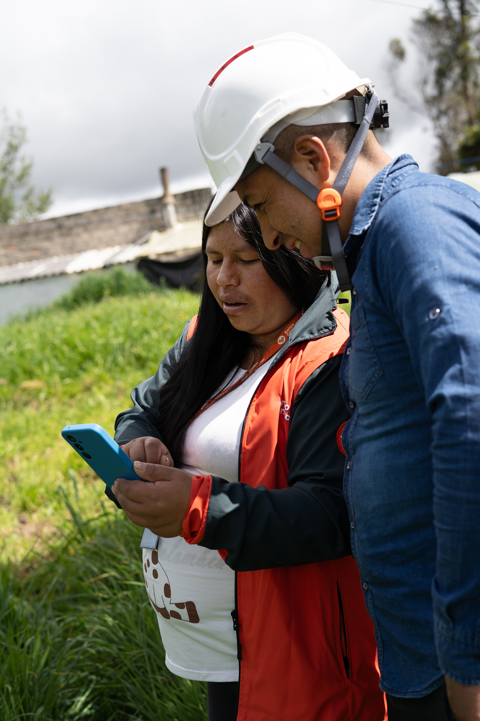 Jhon and his loan officer from Banco Contactar, Carmen