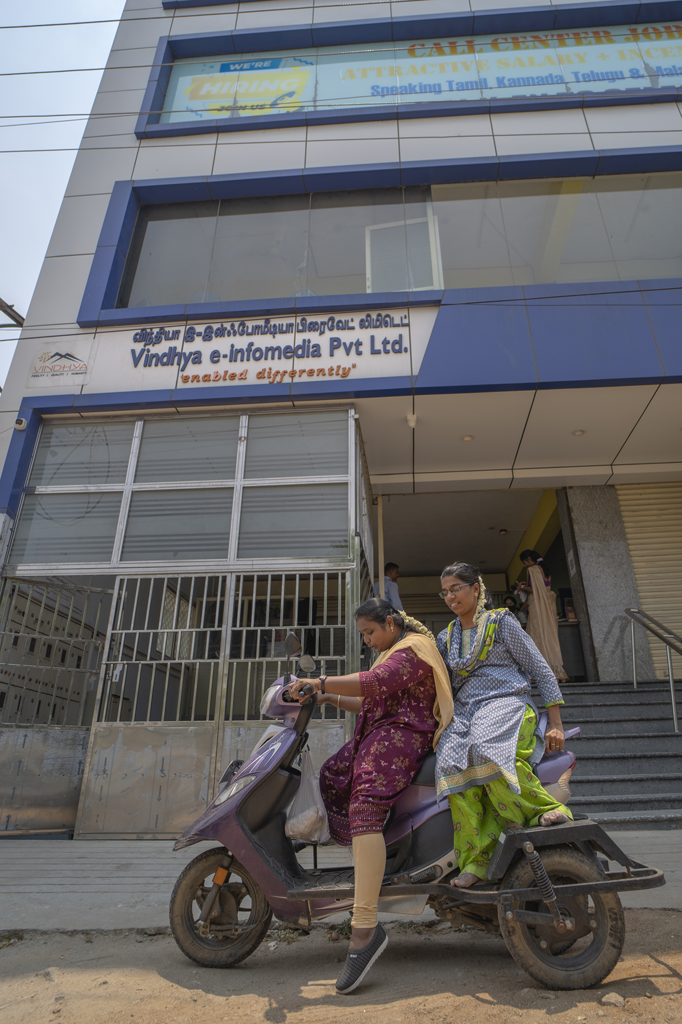 Indhu and her friend commute to work.